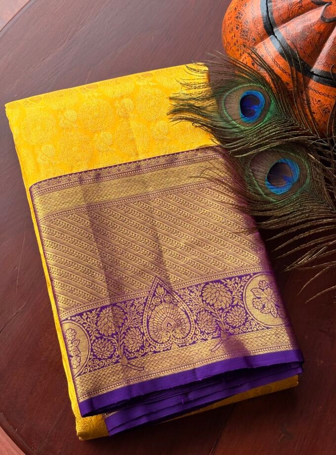 yellow kanchipuram saree